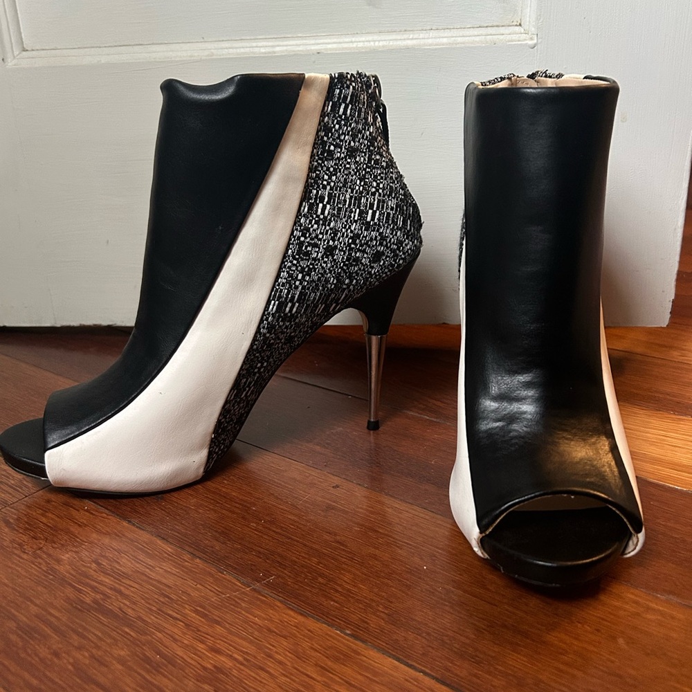 Stylish Black and White Heeled Boots with Peep-Toe
